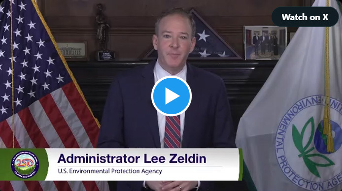 Administrator Zeldin speaking to the camera in front of a dark wood hearth with the EPA flag and US flag behind him.