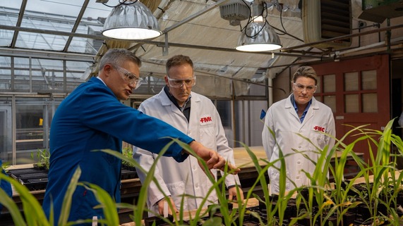 Administrator Zeldin with scientists in lab coat
