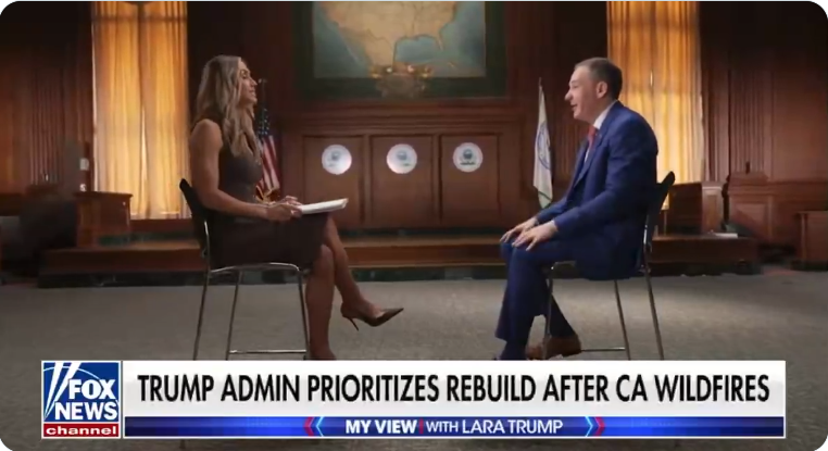 Administrator Zeldin sitting across from an interviewer.