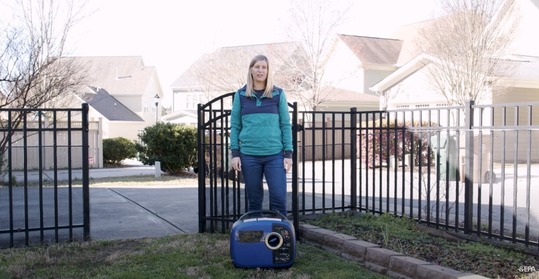 Beth outside with her portable generator