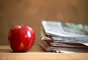 Apple and newspaper 
