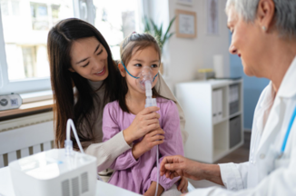 Child with asthma and mother at doctor's appointment