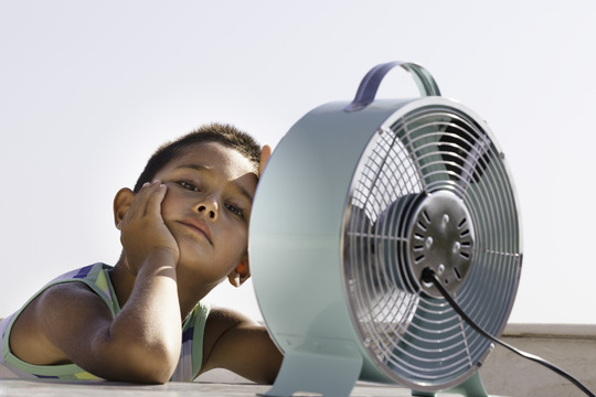 Children with a fan