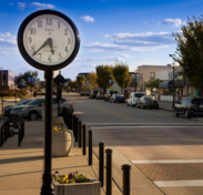 this is a picture of a clock and a revitalized street