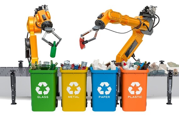 stock image of recycling machinery sorting recycling into bins