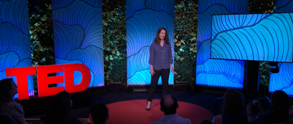 Dana Gunder, president of ReFED, on stage hosting her Ted Talk