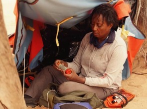 person out in the desert following a crash