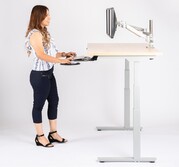 woman at stand up desk