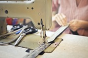 operating a sewing machine