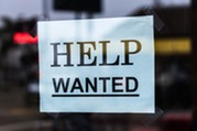 Sign saying "help wanted"