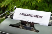 Typewriter with Paper saying the word "announcement"