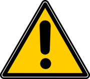 Yellow triangular caution sign 