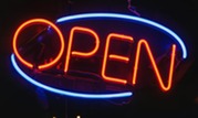 Oval Blue and Orange Open Neon Signage Turned-on