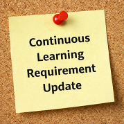 A yellow sticky note pinned to a corkboard with a red pushpin reads “Continuous Learning Requirement Update.”