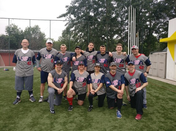 Mathern and her husband pictured with their softball team