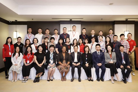 Country Director Vanessa Shaw-Dore and pictured with DIA China 2021 Annual Meeting attendees