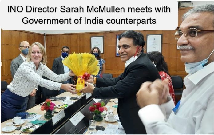 image of Sarah McMullen with Government of India counterparts