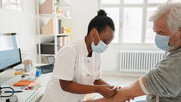 Picture of a doctor administering a test.