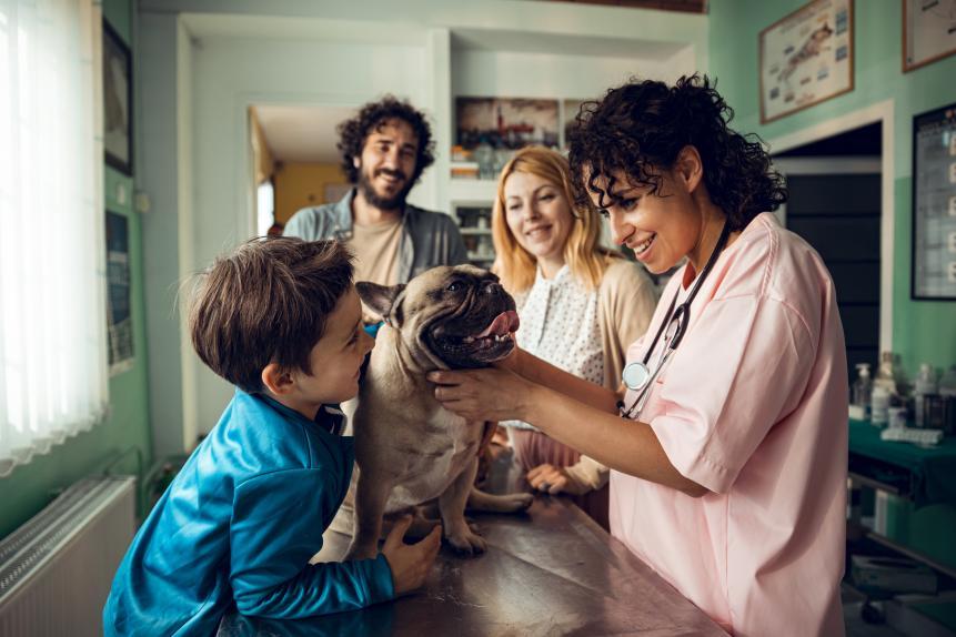 Veterinarian_family_and_dog.jpg