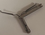 Broken clip after it was removed from patient