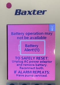 Photo showing alarm on IV pump screen