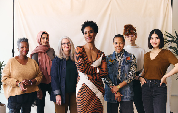 Group of vibrant, healthy, strong and diverse women standing together