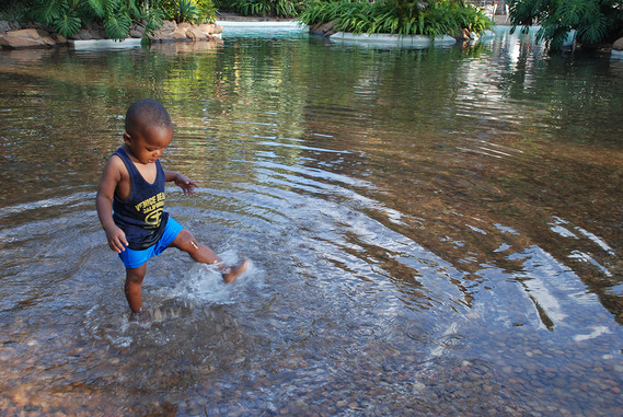 Little boy discovers water