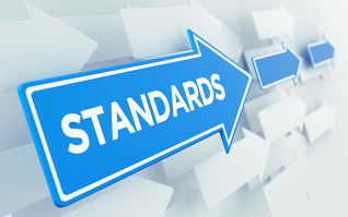 The word Standards with blue arrows