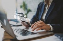 Laptop graphic with the word "feedback" on the back of the computer.