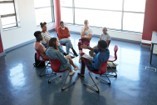diverse group of employees in a roundtable meeting