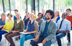 Multi-ethnic group of people in seminar