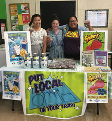 Connecticut FoodCorps members serve blueberry smoothies