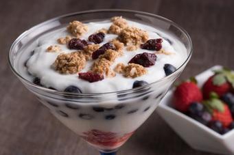 Layer yogurt, berries, and granola for a yogurt parfait treat
