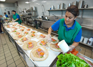 Food service preparing tortilla wraps