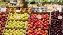 Grocery stocked with a variety of red and yellow apples 