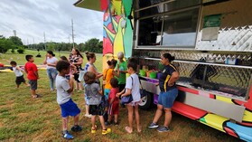 Children receive meals at Seaford School District Mobile Meals Truck
