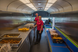 Staff preparing lunch inside the Harrisonburg City Schools Mobile Café. Courtesy Photo