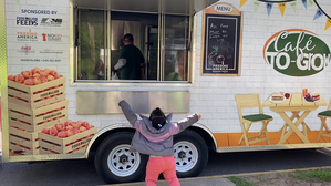 Young girl excited by Feeding Southwest Virginia's Café to Grow mobile meals truck. Courtesy Photo