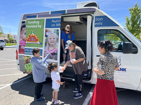 Kids getting lunch from food truck