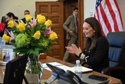 Secretary Rollins at her desk