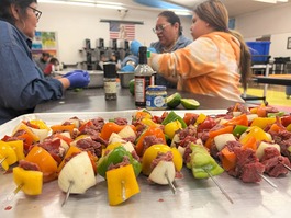 Family cooking kababs