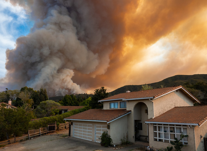 Wildfire smoke over homes
