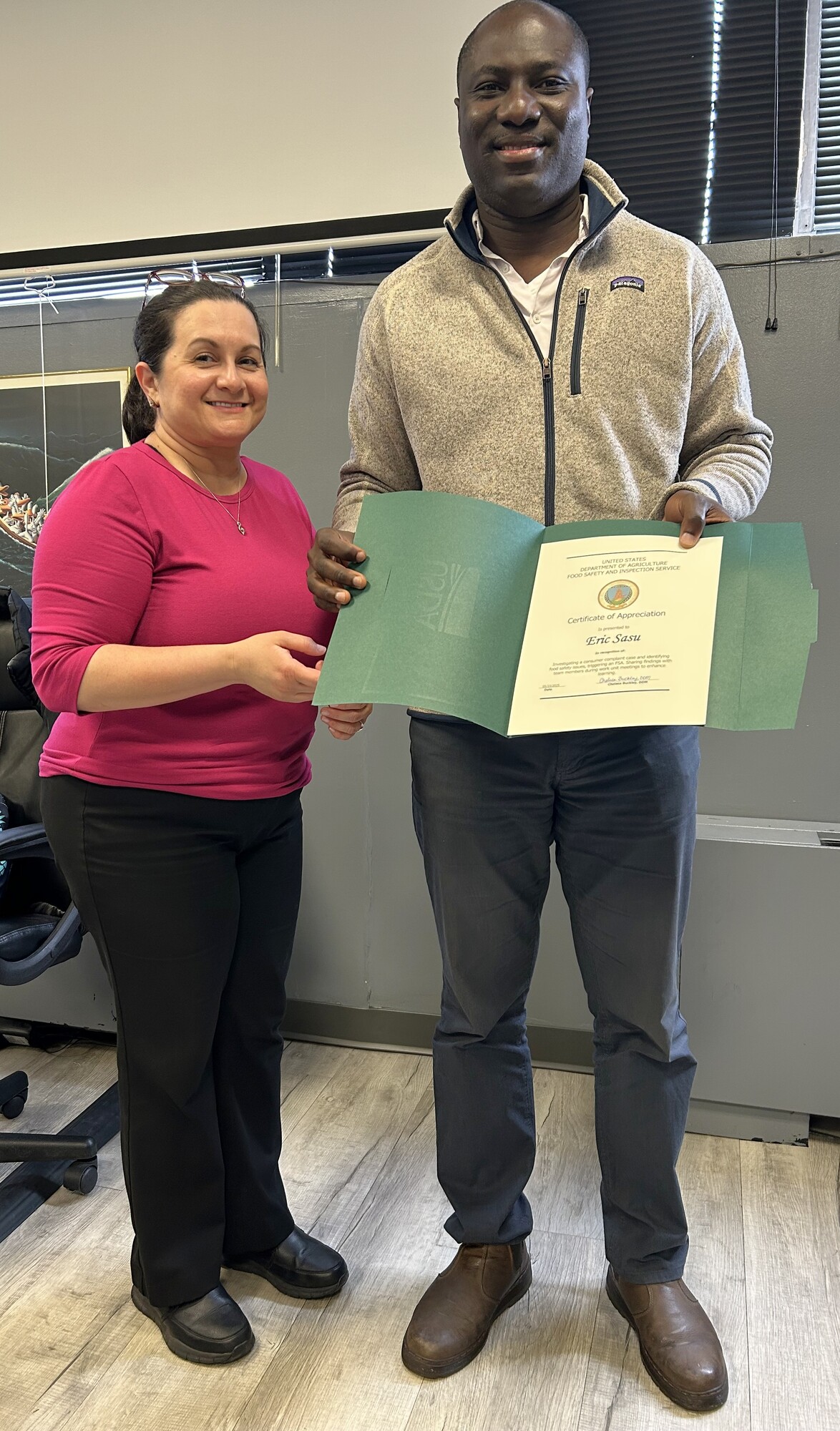 CSI Eric Sasu with Certificate of Appreciation presented by FLS Marilu Simeone