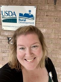 Director Shayla Mae Bailey in front of the USDA building she reports to in rural Virginia