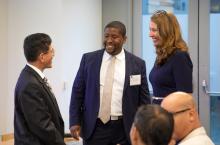 OSDBU Associate Administrator Exodie Roe II and GSA Deputy Administrator Katy Kale share a conversation with a participant during a session.