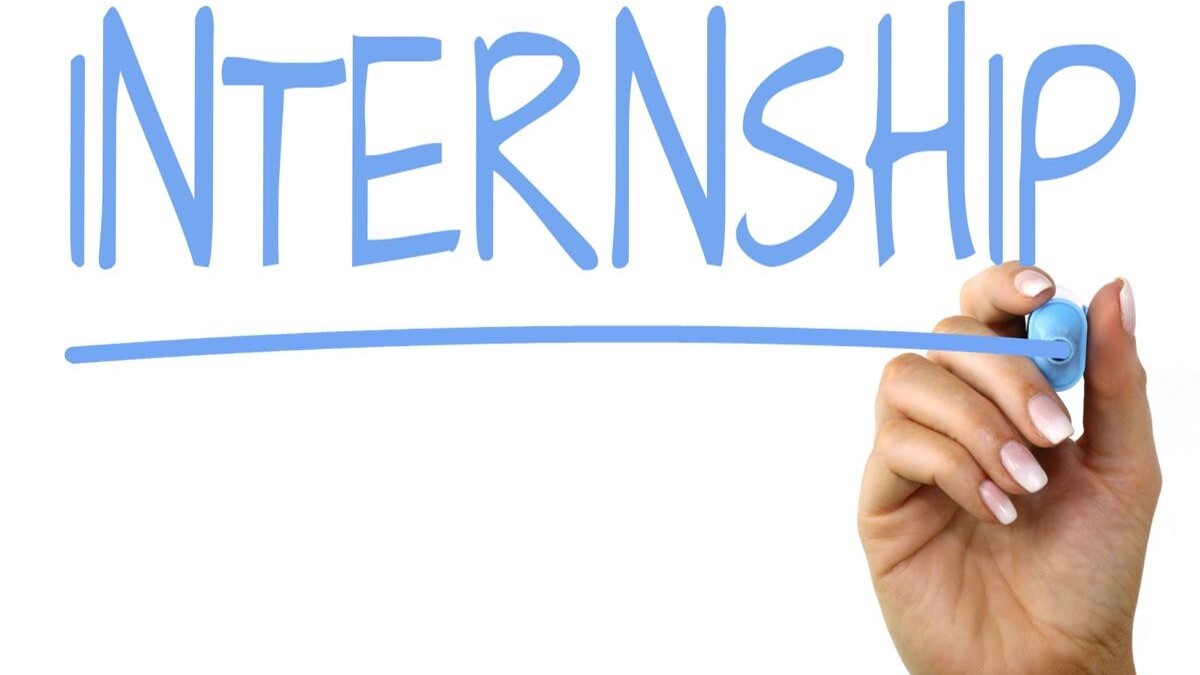 White background with a hand drawing the word "Internship" in blue.