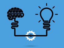 lightbulb and brain connected to represent innovation