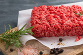 Raw beef on a cutting board