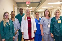 Image of several doctors standing in a health center