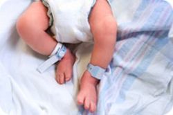 image of an infant's feet and legs